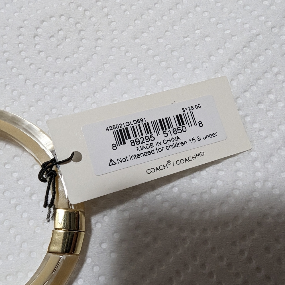 NWT LUCITE CREAM & GOLD COACH BRACELET
ABSOLUTELY SEXY IN SEE THRU - Picture 9 of 11
